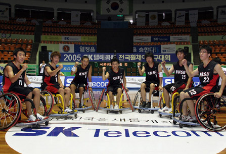 Hanshin University Team vs Korea National Sport University Team, and Seoul Vision Team and Recomefreewings Team are shown playing an opening game on September 9th (The `2005 SK Telecom Cup National Wheelchair Basketball Tournament` hosted by SK Telecom and sponsored by the Korea Wheelchair Basketball Federation, will take place in the Jamsil Student Gymnasium for four days, from September 9th to 12th).